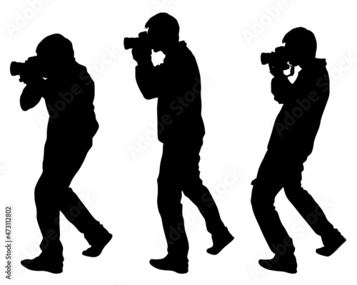Man with a camera on street. Isolated silhouettes of people on white background