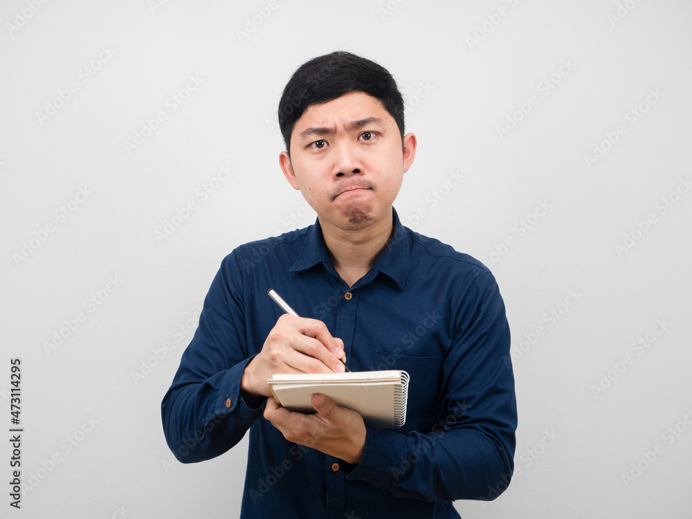 Man serious face writing paper notebook in hand Man serious face writing paper notebook in hand