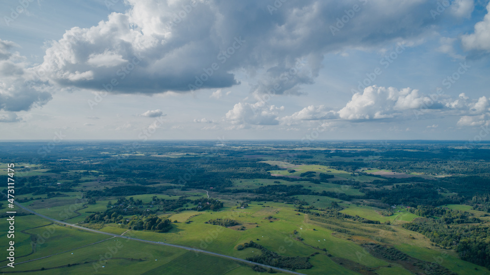 Drone view of fields, forests and sky. Drone view of fields, forests and sky.
