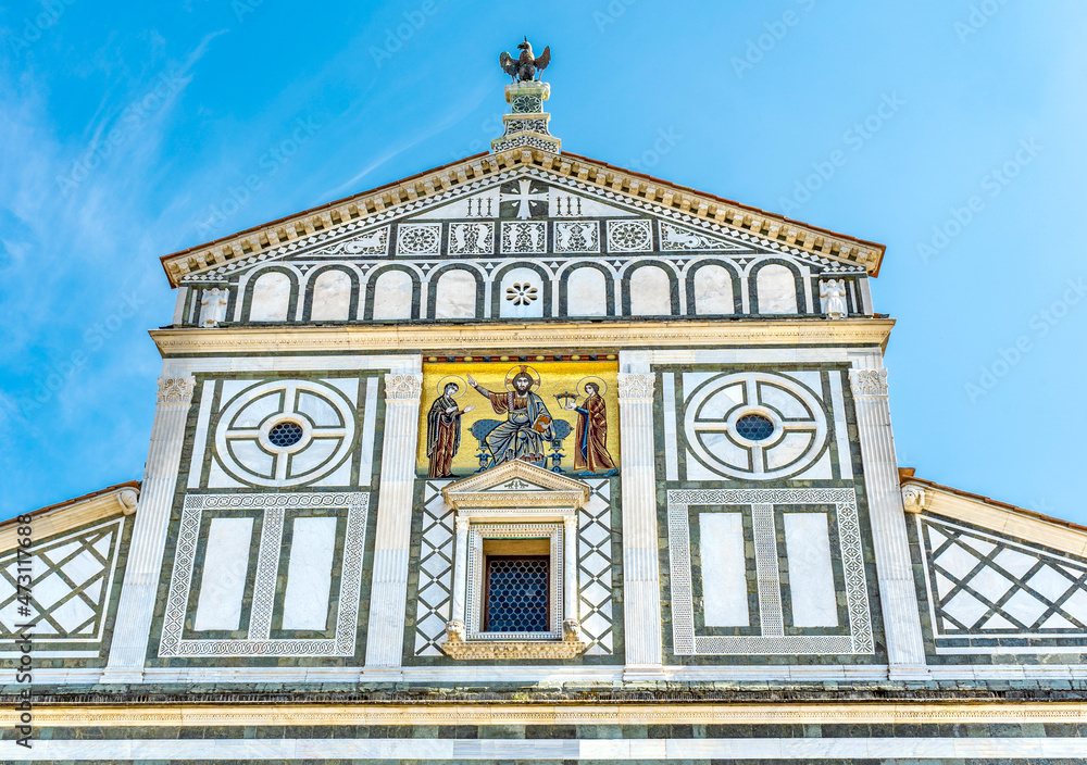 The façade of the Basilica of San Miniato al Monte (St. Minias on the Mountain), one of the finest Romanesque structures in Tuscany, built in 11th the century, Florence, Italy