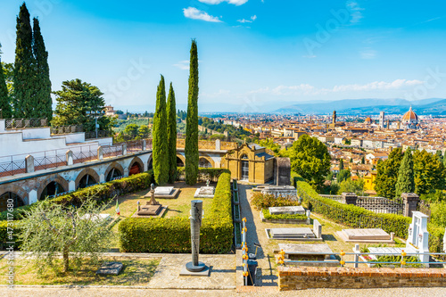 The monumental cemetery of the  Porte Sante  next to the Basilica of San Miniato al Monte  St. Minias on the Mountain  with a panoramic view of Florence city center  Tuscany  Italy