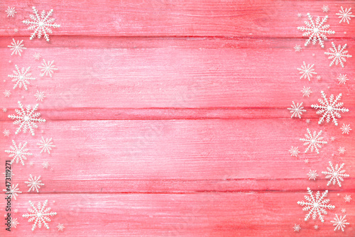 Winter wooden pink rose red nature background with snowflakes two sides. Texture of painted wood horizontal boards. Christmas, New Year card with copy space. Can be used for websites, brochures, poste