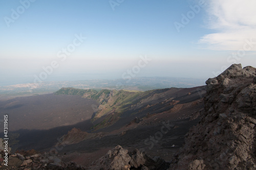 Vista paesaggio della Vallata del Vulcano Etna con rocce in primo piano photo