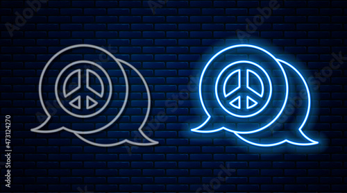 Glowing neon line Peace icon isolated on brick wall background. Hippie symbol of peace. Vector