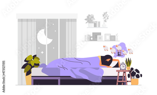 tired woman sleeping in bed with alarm clock girl dreaming and counting sheep living room interior horizontal