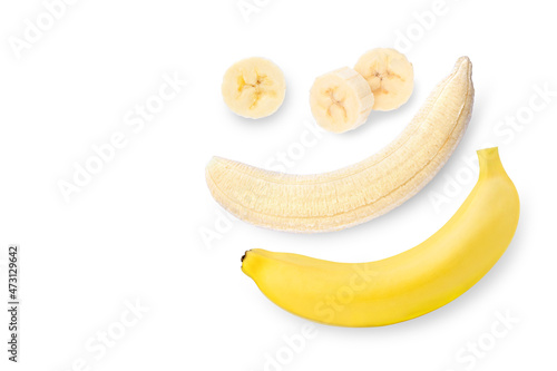 Banana fruit with slices isolated on white background. Top view. Flat lay.