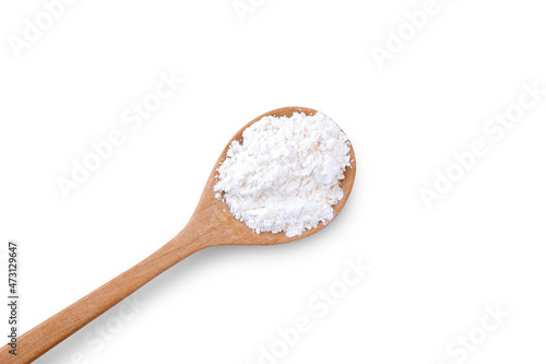 Calcium hydroxide powder (Deydrated lime) in wooden spoon isolated on white background. Top view. Flat lay.