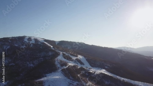 Aerial view: Morning view of Wonderful view of the winter ski slope in Transcarpathian. Ukraine. 4k photo