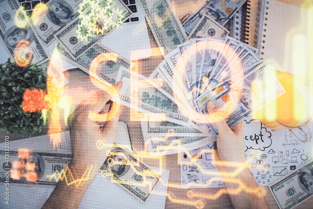 Multi exposure of seo drawing hologram and us dollars bills and man hands. Multi exposure of seo drawing hologram and us dollars bills and man hands.
