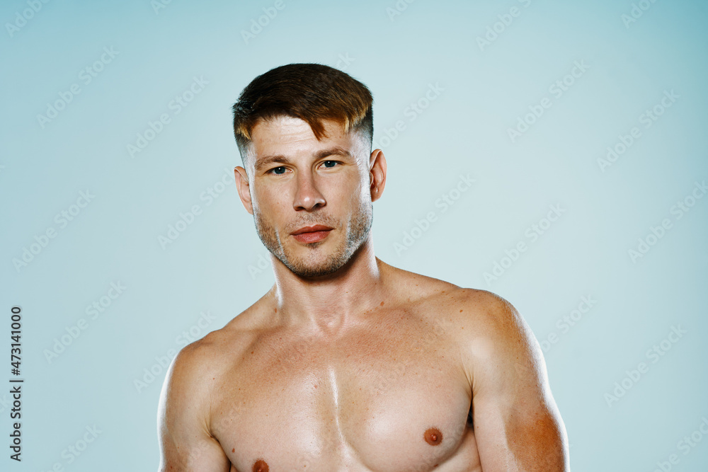 Fototapeta premium handsome sporty man with pumped body workout fitness