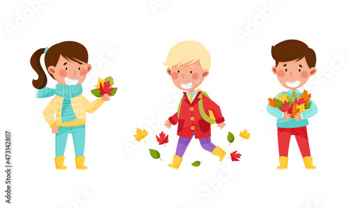 Kids playing outdoors in autumn set. Happy children collecting colorful leaves cartoon vector illustration