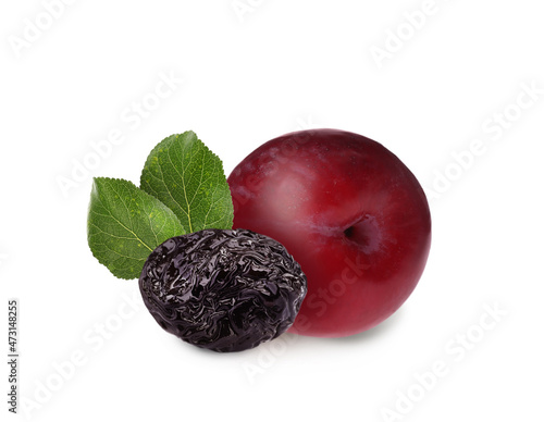 Delicious fresh ripe plum and sweet dried prune on white background