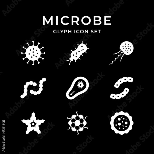 Set glyph icons of microbe and bacterium isolated on black