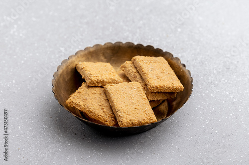 Gajak or til patti is a dry sweet cake - made of sesame seeds, ground nuts and jaggery, consumed in India  especially in winter during Makar Sankranti and Lohri festival