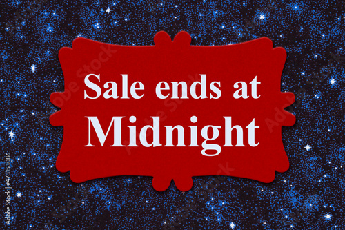 Sale ends at midnight sign on night sky with stars
