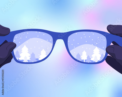 Looking through glasses with winter landscape