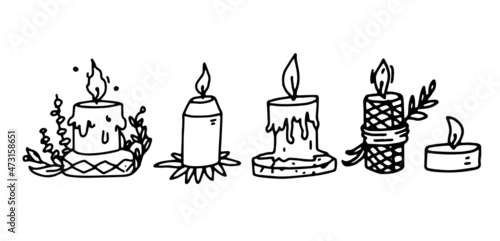Candles set in doodle outline style. Vector illustrations of handdrawn candle icons. Handmade candles isolated on a white background