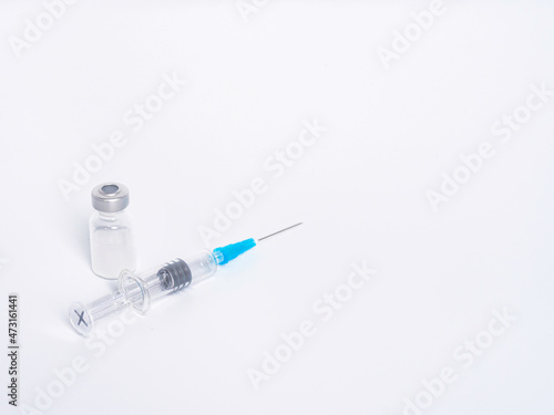 Vaccine vial with syringe