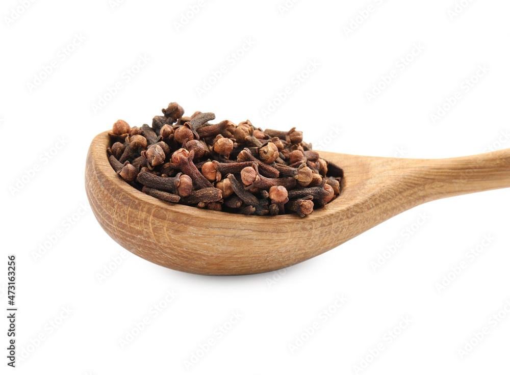 Wooden spoon with aromatic dry cloves isolated on white, closeup Wooden spoon with aromatic dry cloves isolated on white, closeup