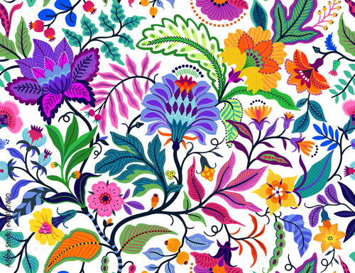 Seamless floral pattern with bright colorful flowers and tropic leaves on a white background. The elegant the template for fashion prints. Modern floral background. Trendy Folk style.