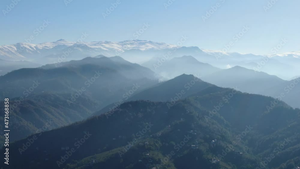 Aerial view of a village in the lush green rain cloud cover rain forest mountain during the rainy season in the northern Turkey Trabzon Aerial view of a village in the lush green rain cloud cover rain forest mountain during the rainy season in the northern Turkey Trabzon