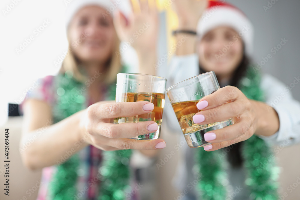 Best friends doing clink with glasses filled with tasty champagne drink Best friends doing clink with glasses filled with tasty champagne drink