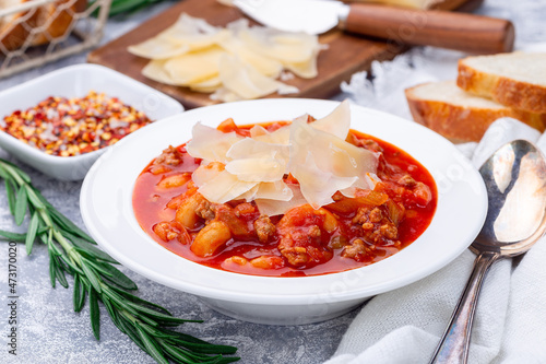Fototapeta Naklejka Na Ścianę i Meble -  Homemade minestrone soup with cavatappi pasta, beans and vegetables, horizontal