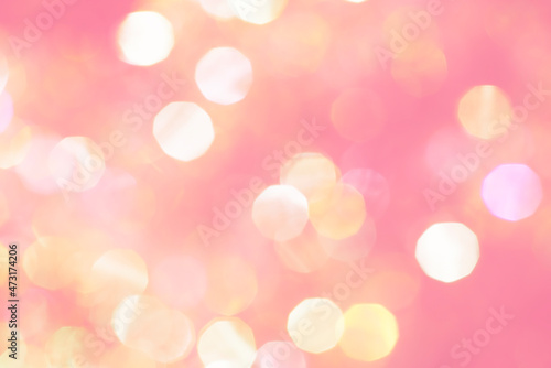 Beautiful natural bokeh of the colorful lights. Abstract Christmas New Year backdrop for text or advertising. Template for banner or party invitation