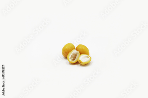 Raw dates palm-yellow dates isolated on white background