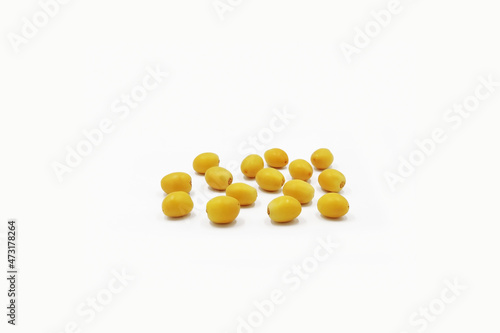 Raw dates palm-yellow dates isolated on white background
