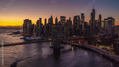 Wallpaper Mural Evening hyperlapse of big modern city. Fly over bridges and view tall downtown skyscrapers against dimming sunset sky. Manhattan, New York City, USA Torontodigital.ca