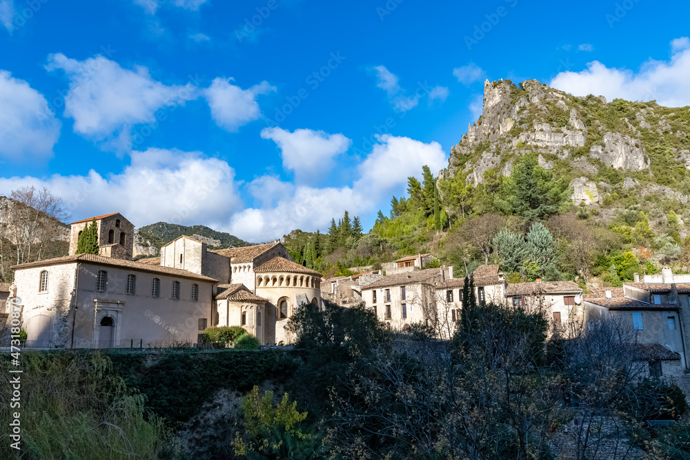 Saint-Guilhem-le-Desert in France, view of the village and the abbey
