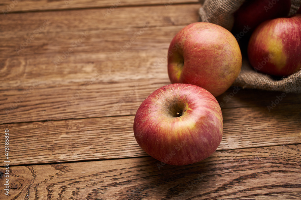 apples on a wooden table vitamins fresh fruits organic apples on a wooden table vitamins fresh fruits organic