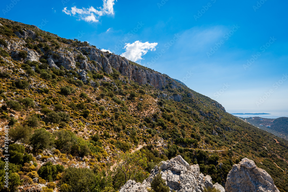 Fototapeta premium Lycian way hiking and trekking route, path, road in Mediterranean area with rocks, mountains. Mountain landscape image taken on the Lycian way trek in Turkey