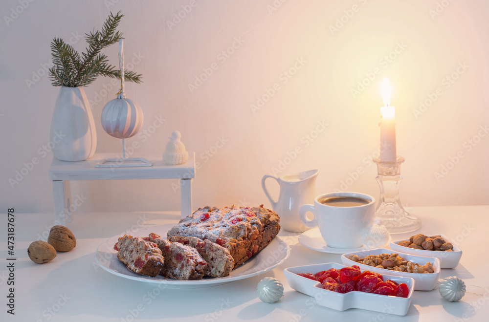 christmas baked goods with cup of coffee on white table