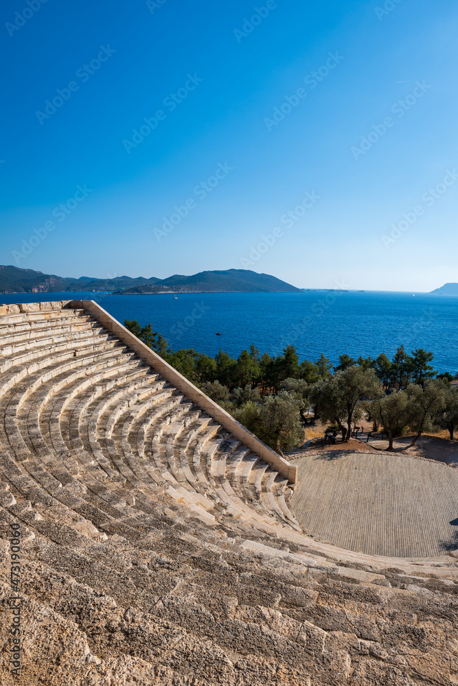 The Theatre of Antiphellos in Kas, Antalya. Landscape view on famous architectural landmark in popular resort town of Kas, Turkey