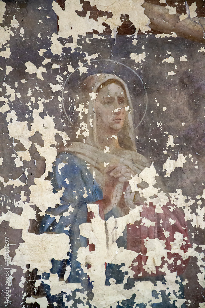 frescoes on the walls of an abandoned temple