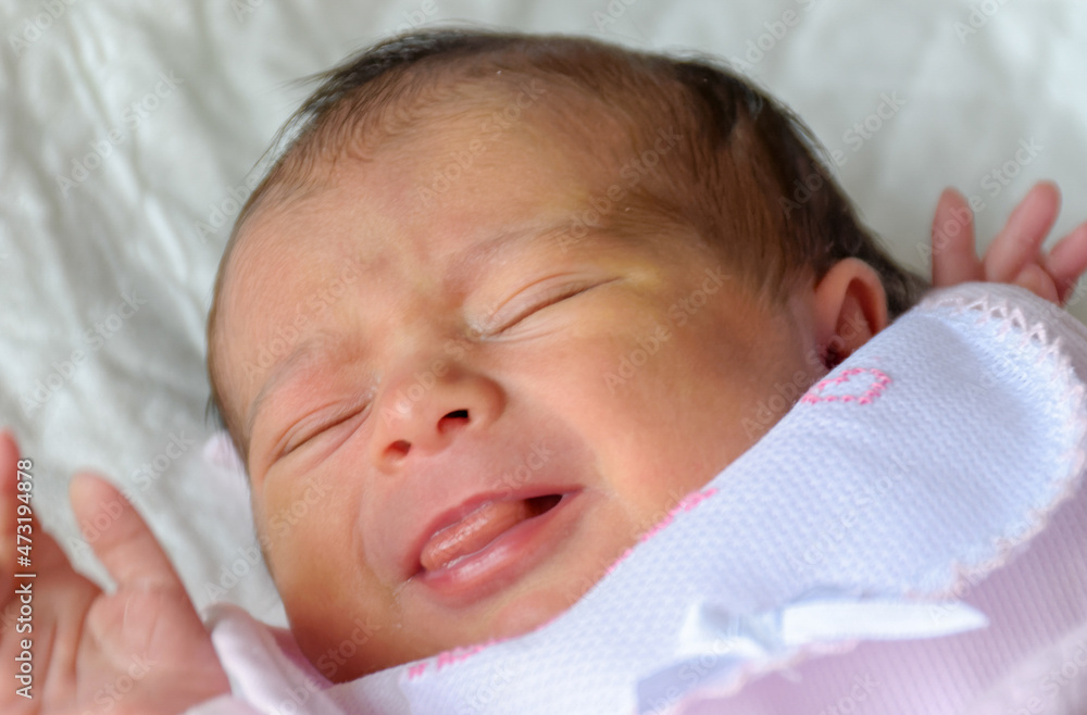 Newborn baby girl in the cradle Newborn baby girl in the cradle