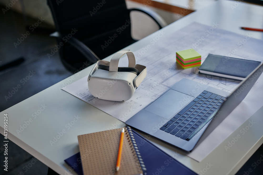 Close up of business table with vr and laptop Close up of business table with vr and laptop