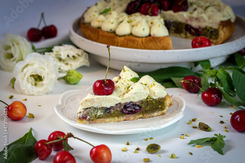 Cherry pie with pistachio cream  basil  and whipped cream.