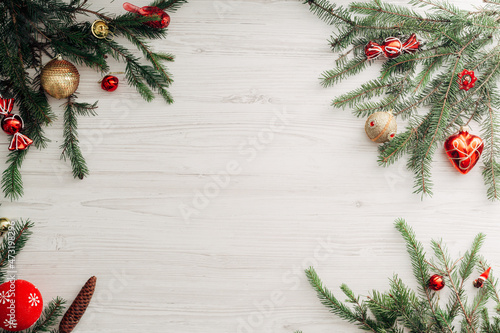 Christmas Composition on a White Wooden Table with Copy Space