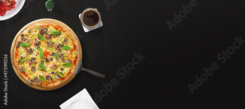 Pizza on dark background. Top view of hot tasty traditional Italian pizza. Good use for advertising.