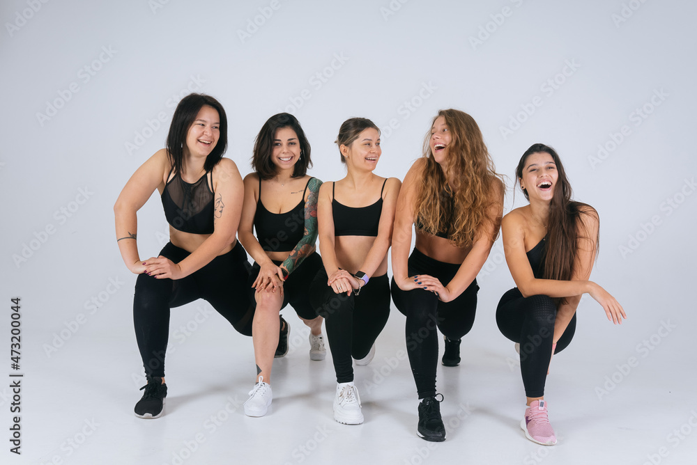 Fototapeta premium diverse models laughing, enjoying time together, look at camera