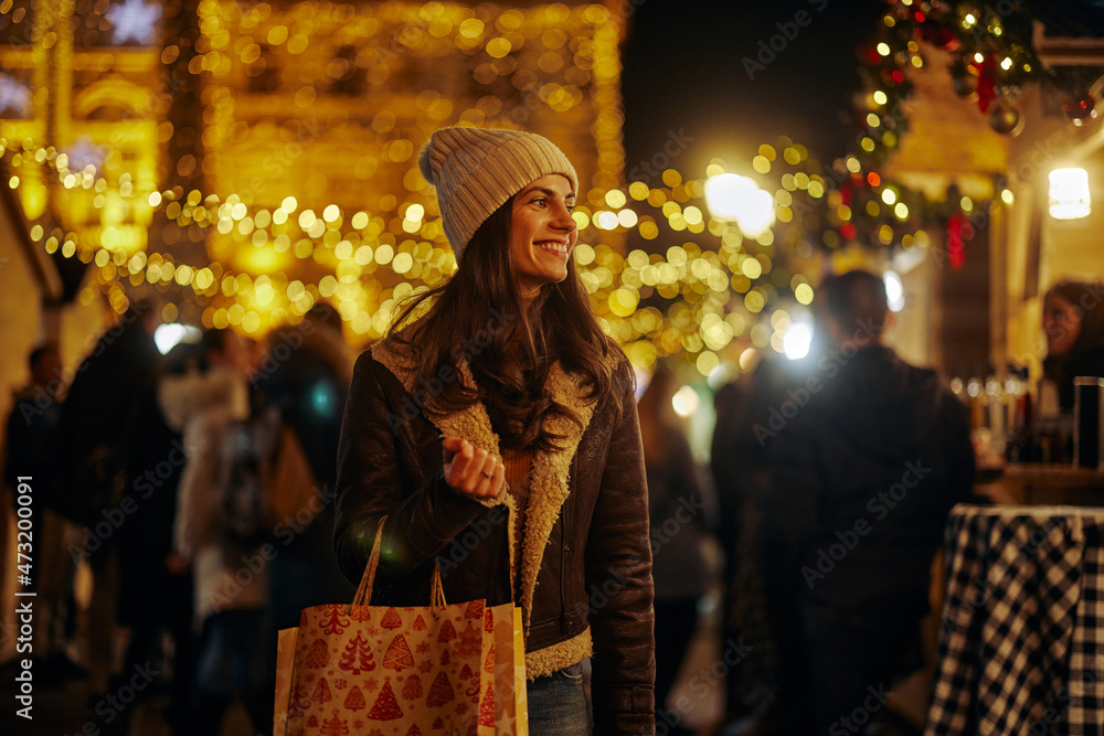 Young woman at festive night in the city