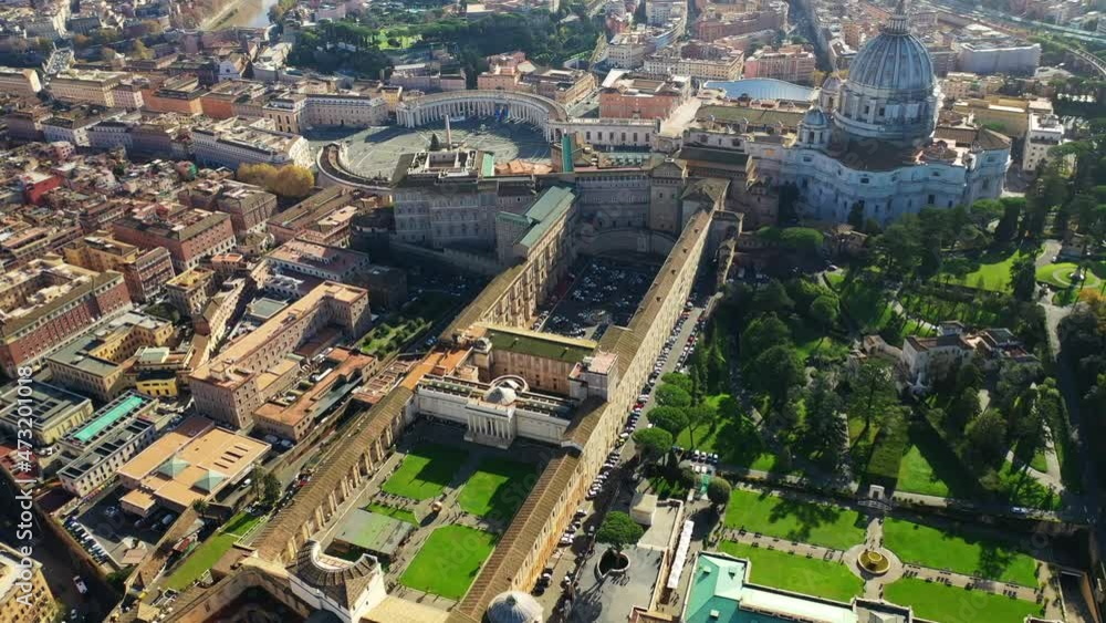 Aerial drone video of iconic masterpiece Saint Peter Basilica and city of Vatican the biggest church in the world, Metropolitan city of Rome, Italy Aerial drone video of iconic masterpiece Saint Peter Basilica and city of Vatican the biggest church in the world, Metropolitan city of Rome, Italy