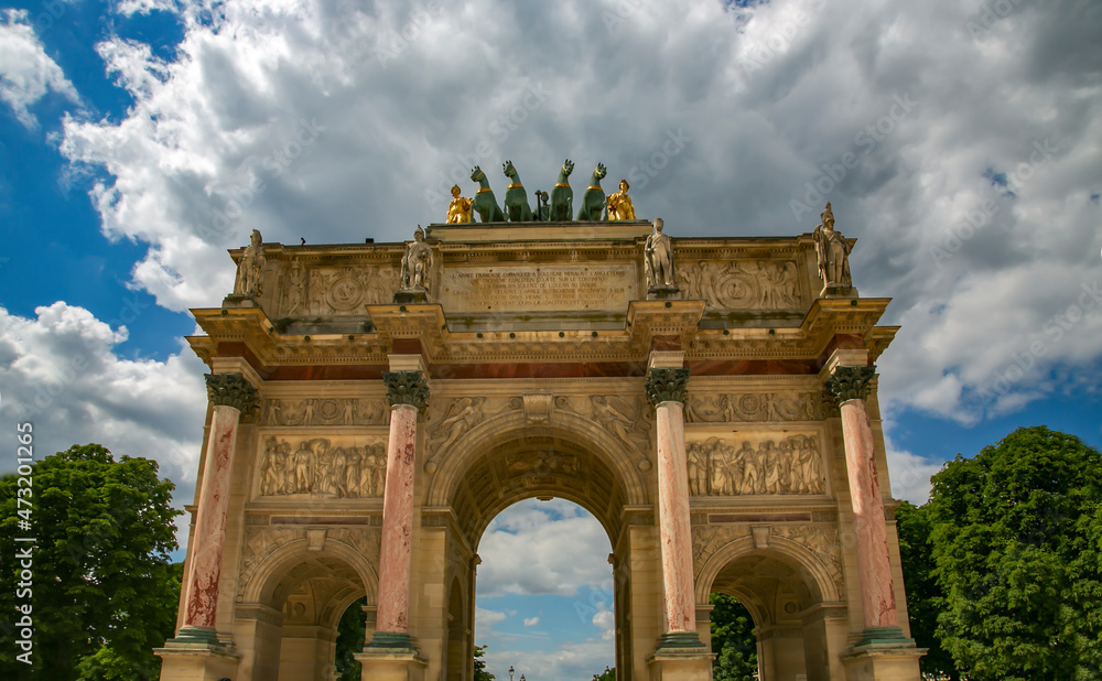 Arc de Triomphe du Carrousel or Triumphal Arch at Carrousel Place monument is a tribute to Napoleons military victories in Paris, France