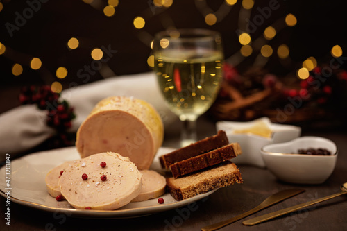 Foie gras, goose liver traditional french starter for winter holidays celebration. Cristmas appetizer for buffet, festive dinner concept