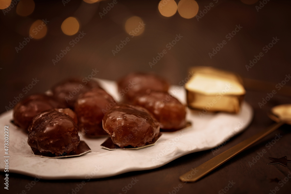 Glazed chestnuts, traditional french sweets for winter holidays celebration. Cristmas dessert, festive dinner concept Glazed chestnuts, traditional french sweets for winter holidays celebration. Cristmas dessert, festive dinner concept