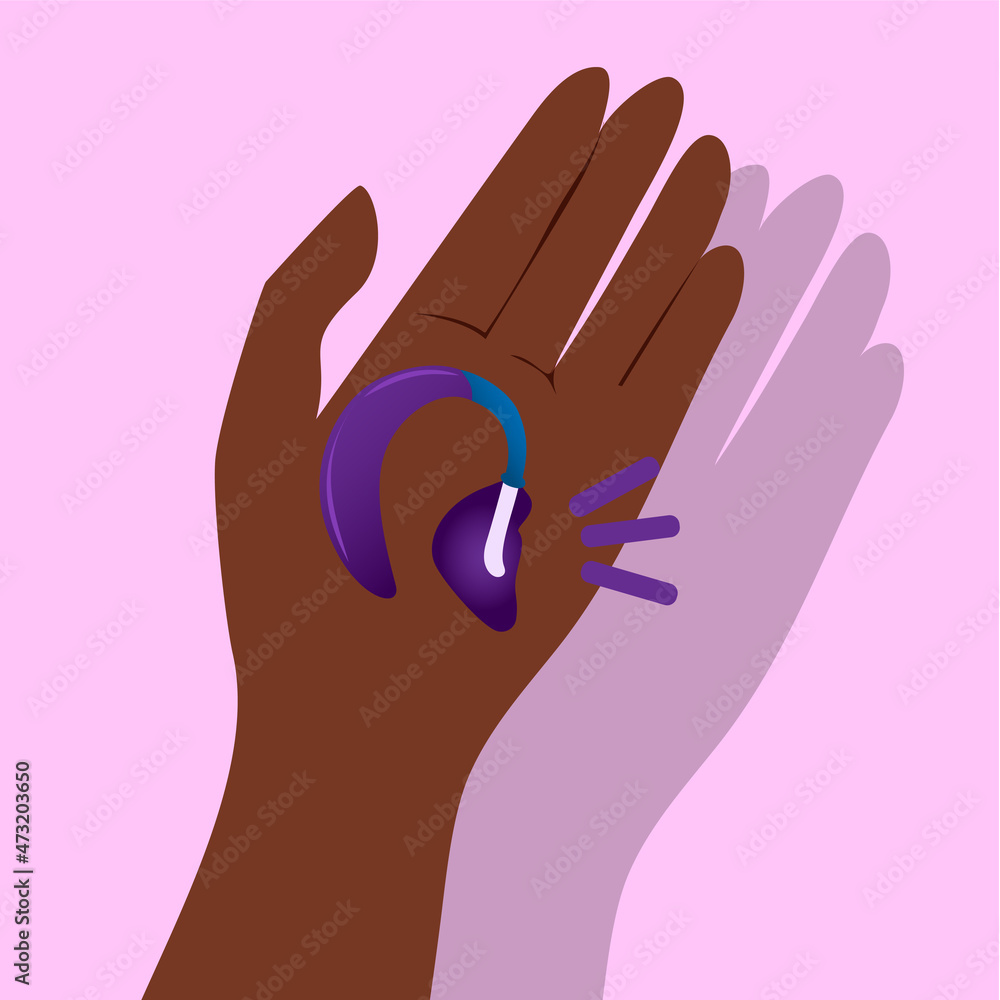 Obraz premium hand holding hearing aid