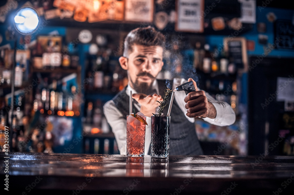 Barman concocts a cocktail at the beerhouse